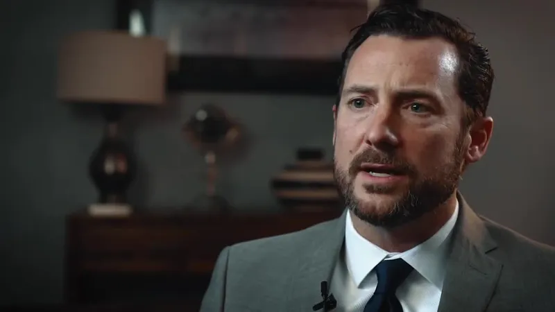 An attorney speaking in an interview, a still from the Buckmaster & Ellzey brand film